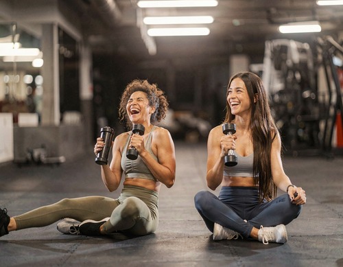 Women Laughing in Gym