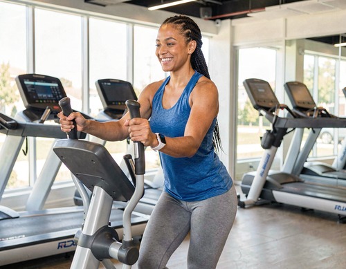 Woman on Elliptical Trainer