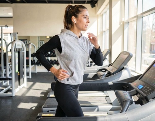 Woman Running on Treadmill