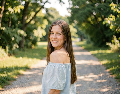 Woman in Park Smiling