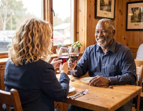 Wine Toast in Cozy Restaurant