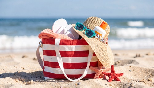 Beach Essentials Bag on Sandy Shore