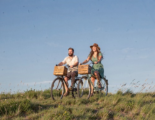Couple Cycling on Hilltop