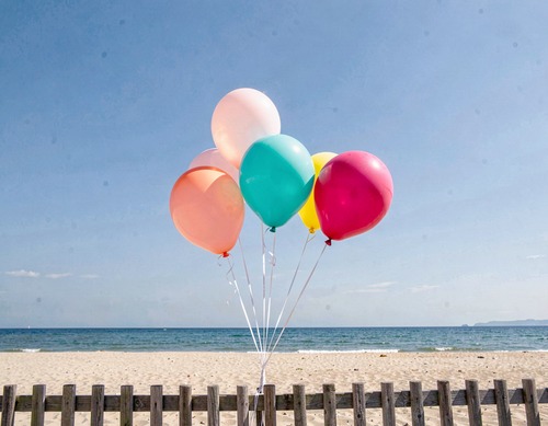 Colorful Balloons on Beach