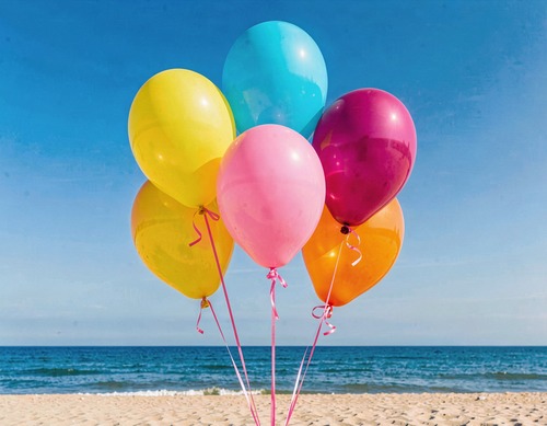 Beach Balloons in Bright Sunlight