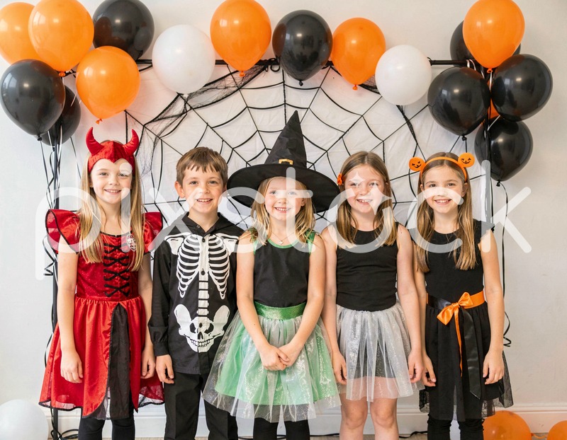 Kids in Halloween Costumes Celebrating
