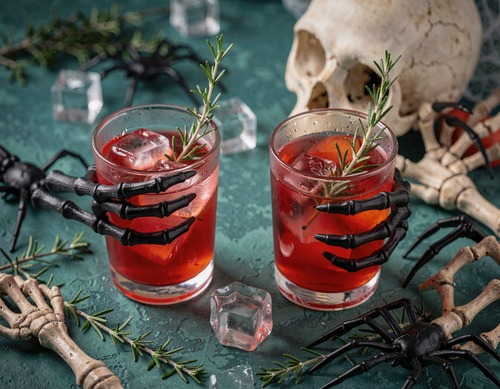 Halloween Cocktail with Skeleton Hands