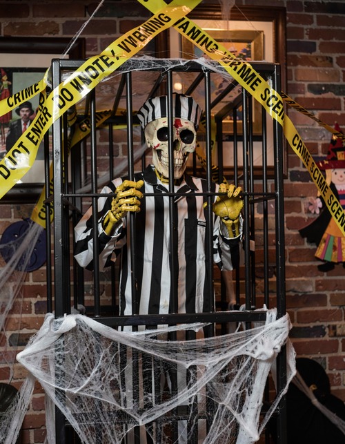 Halloween Prison Skeleton in Caged Scene