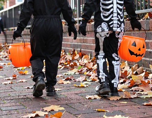 Halloween Trick-or-Treat Kids with Pumpkin Buckets