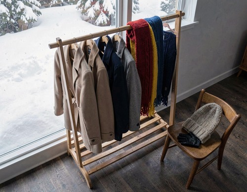 Empty Winter Wardrobe by Snowy Window