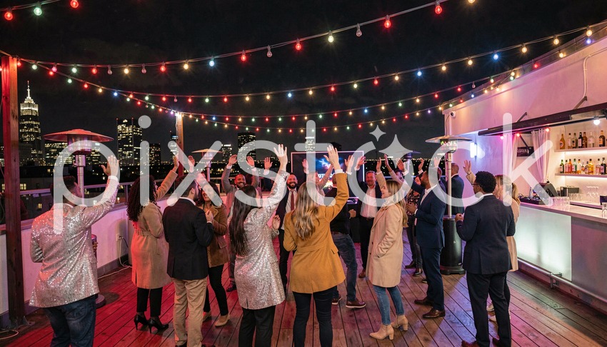 Rooftop Party Dancers Under Colorful String Lights