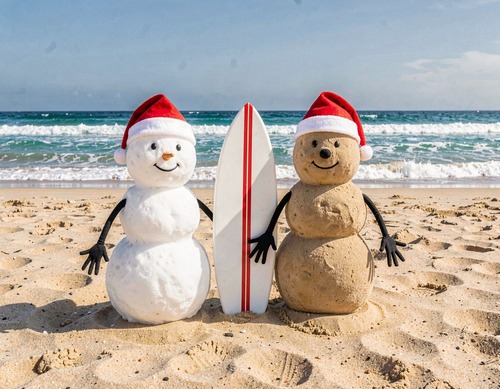 Snowmen on Beach with Surfboard