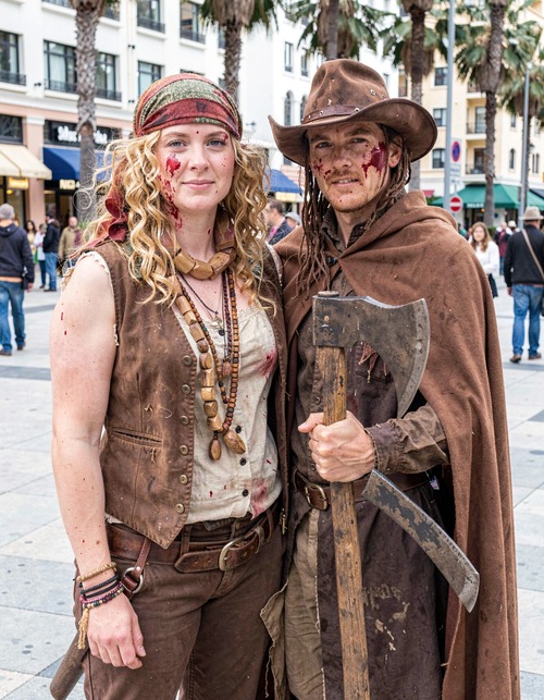 Two Costumed Figures in Urban Setting