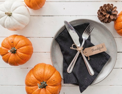 Thanksgiving Table with Pumpkins and Pinecone