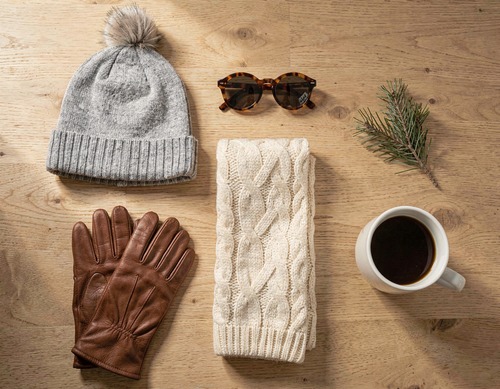 Winter Accessories Flat Lay on Wooden Table